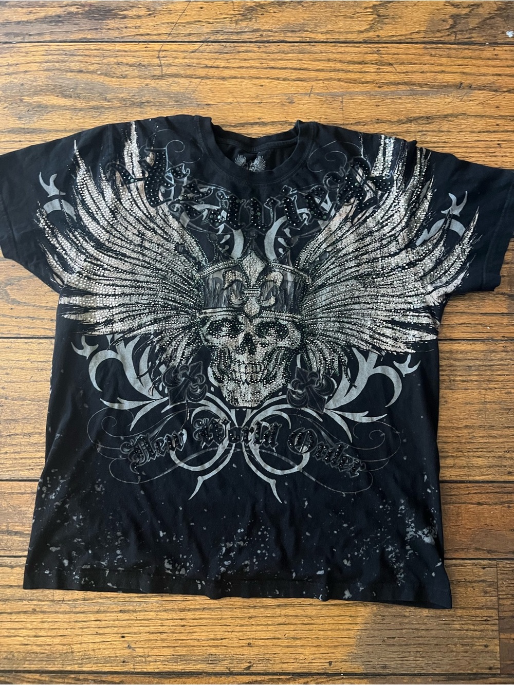 Xzavier 
Men's Black Long Sleeve Graphic Tee with Winged Skull